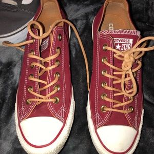 burgundy converse and black converse , 30 each